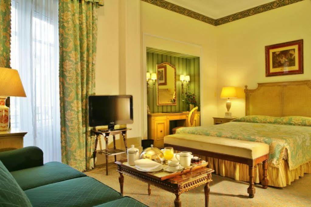 Hotel Avenida Palace Lisbon Ruang foto A room at the hotel